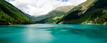 Landscape with lake and small spiaggetta lawn of the Trentino Al